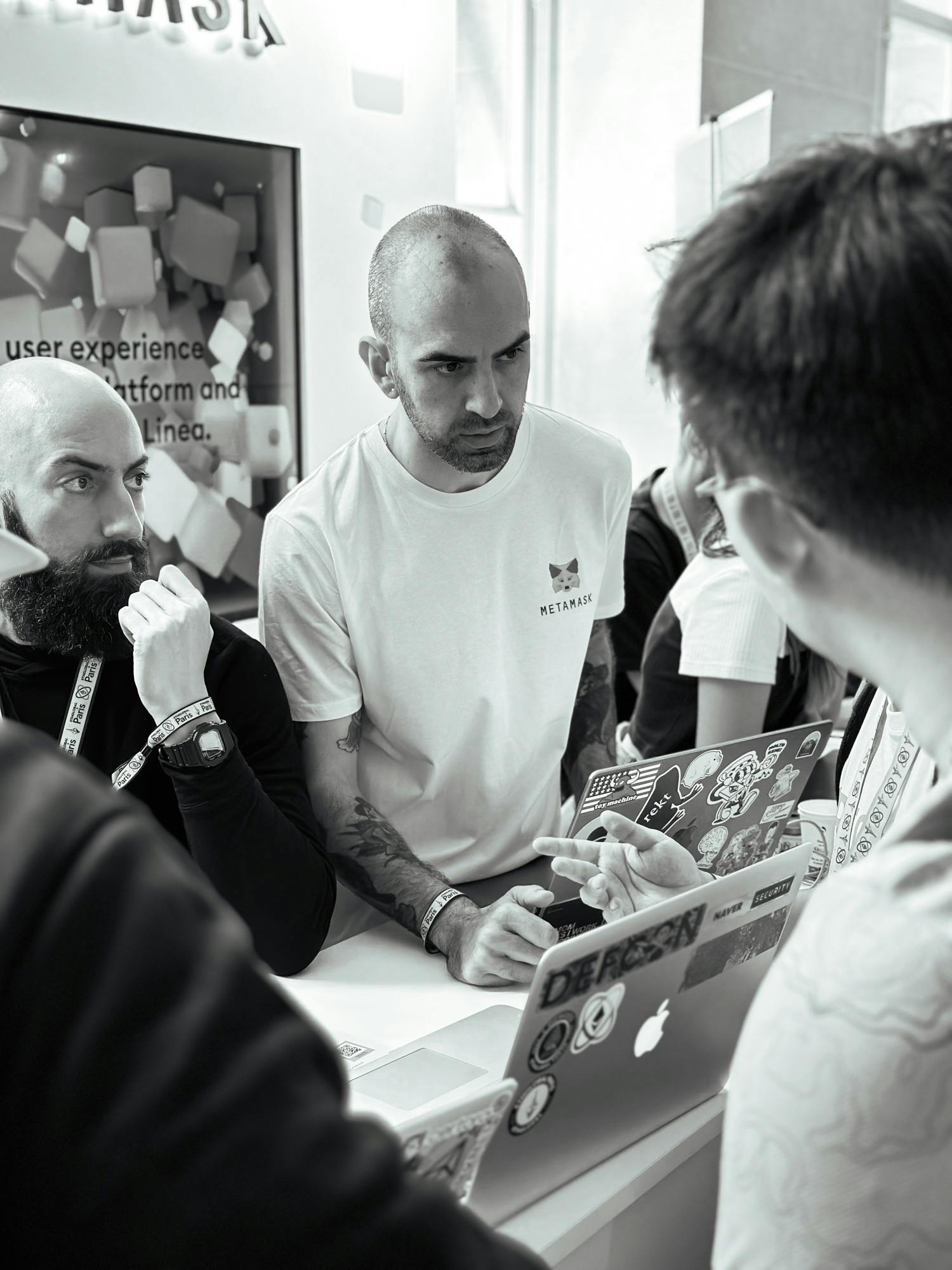 DevRels Mirko Garozzo & Ziad Saab talk with hackers at the judging for ETHGlobal Paris. 
