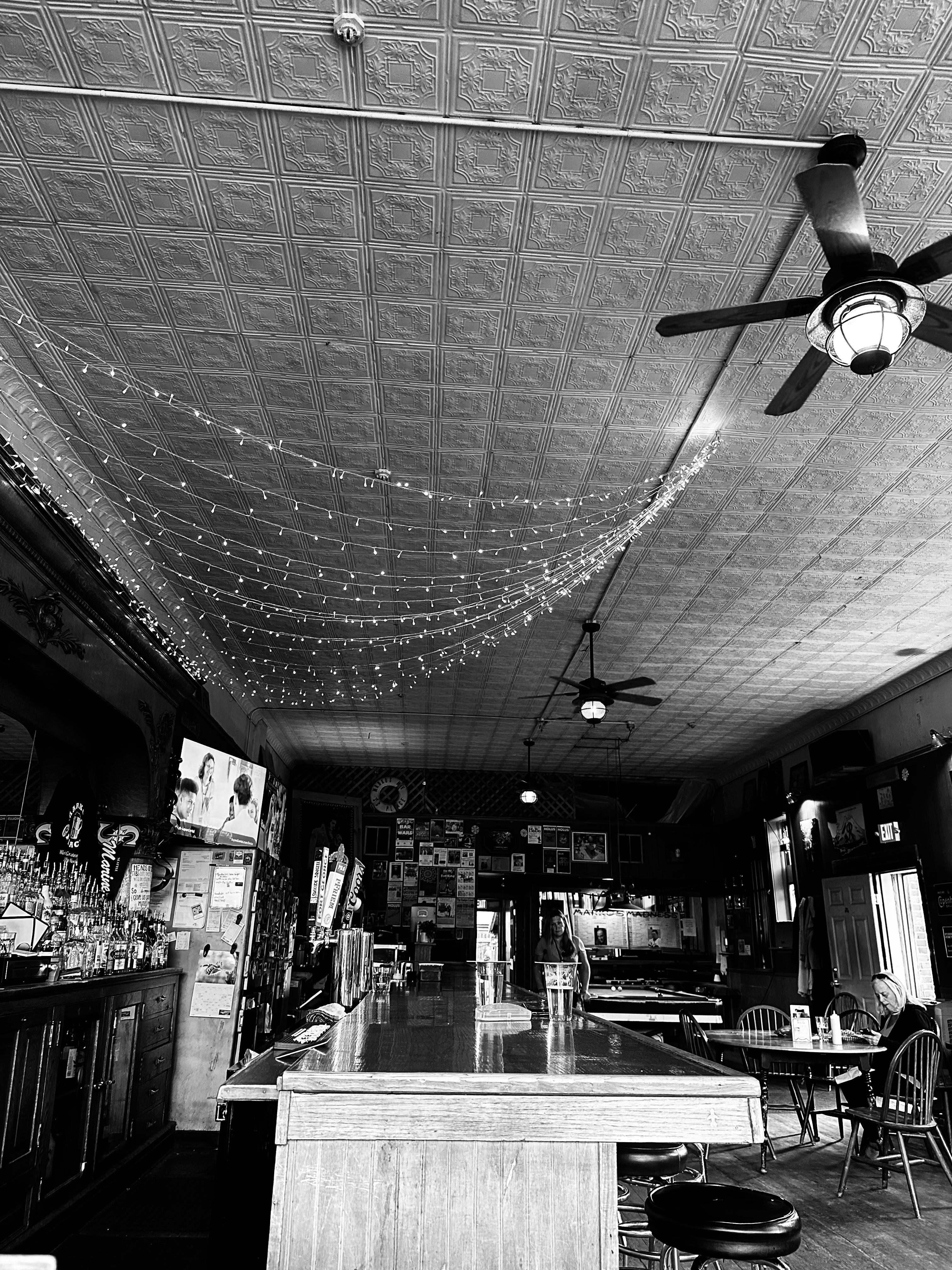 The locals bar is a quiet reprieve from the booming Memorial Day tourism boom happening just one block over.
